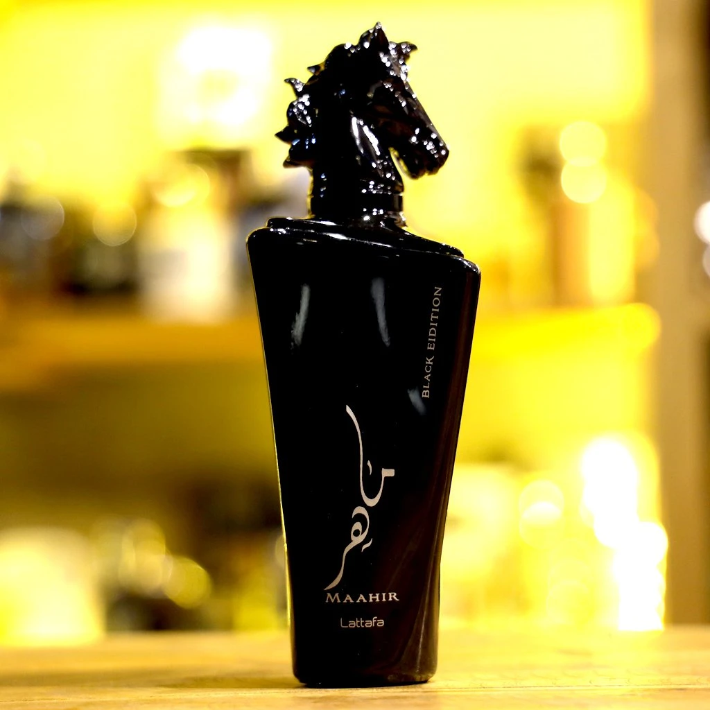 Lattafa Maahir Black Edition perfume bottle and box