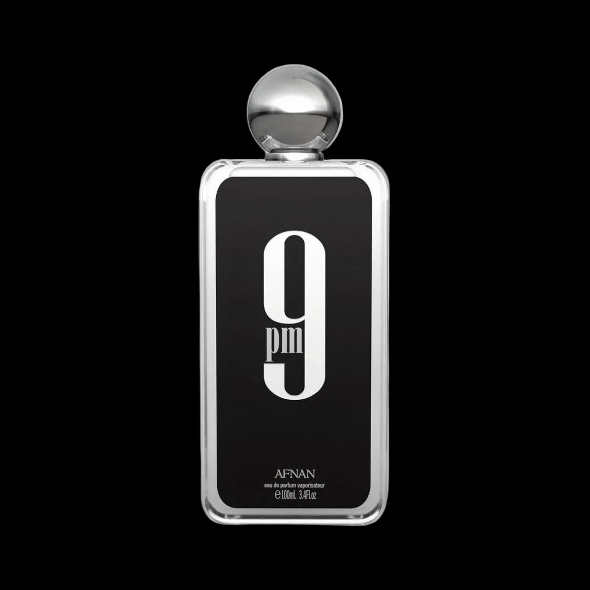Afnan 9pm perfume bottle with silver spherical cap, black label with large white 9pm logo, on black background