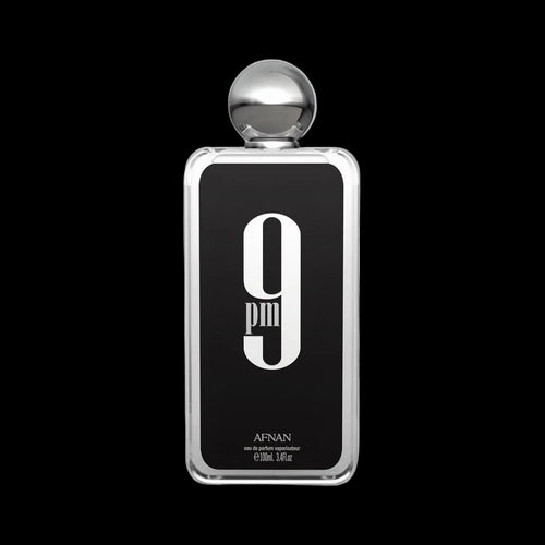 Afnan 9pm perfume bottle with silver spherical cap, black label with large white 9pm logo, on black background