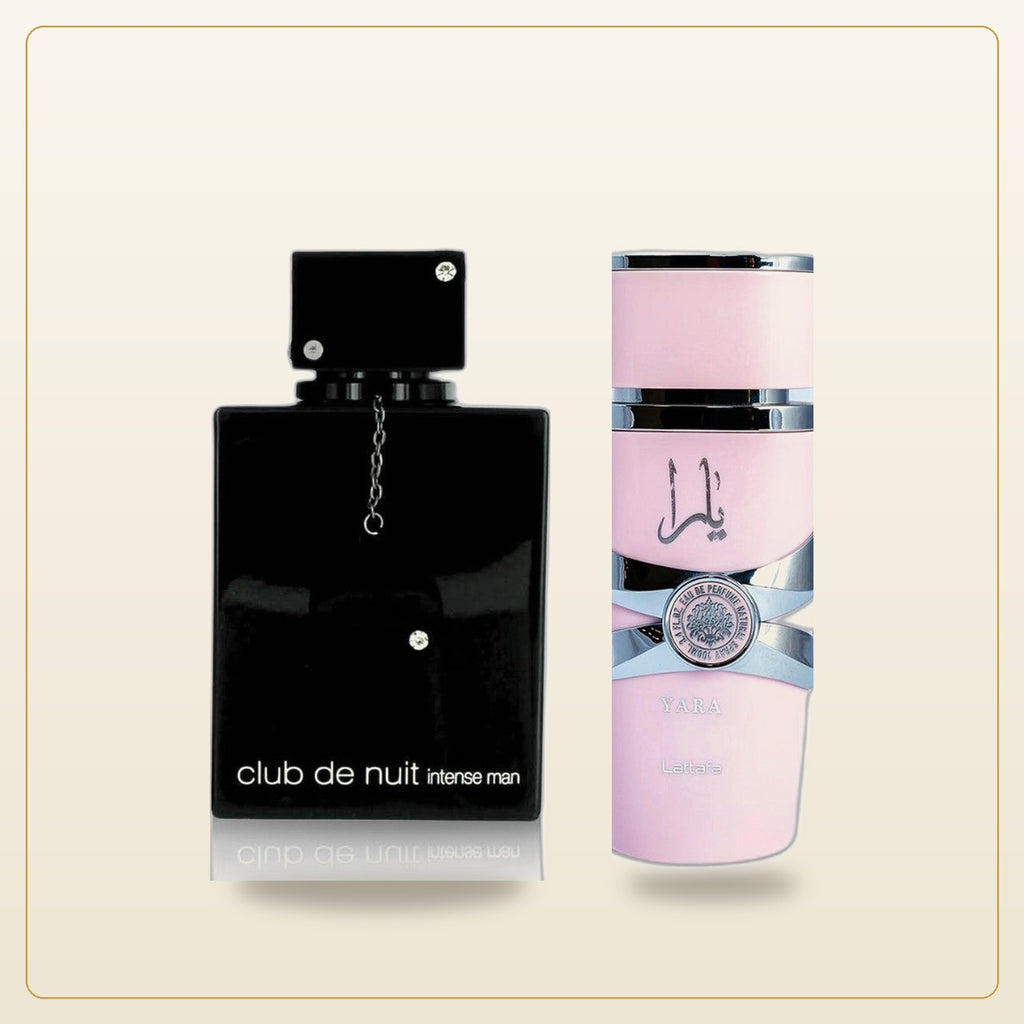 Black Club de Nuit Intense Man bottle next to pink Lattafa Yara bottle, both standing on plain off-white background